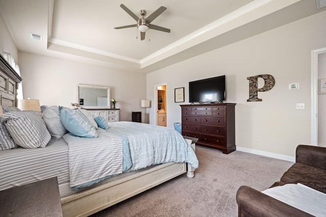 291 Lucca Dr, Summerville, SC 29486 - bedroom with a raised ceiling, light carpet, ensuite bath, and a ceiling fan