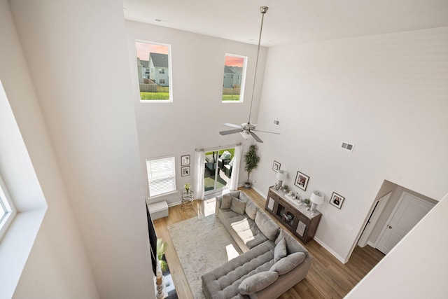 291 Lucca Dr, Summerville, SC 29486 - living room with wood finished floors, a high ceiling, and a ceiling fan