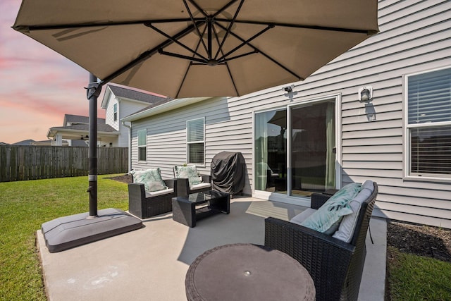291 Lucca Dr, Summerville, SC 29486 - patio terrace at dusk with an outdoor hangout area, a patio area, and a grill