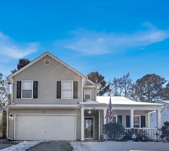 view of property with a garage