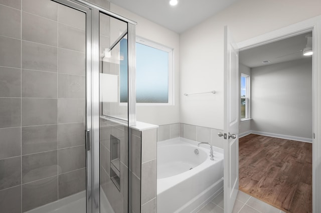 139 Dantzler Rd, Harleyville, SC 29448 - bathroom featuring recessed lighting, wood finished floors, a shower stall, and a bath