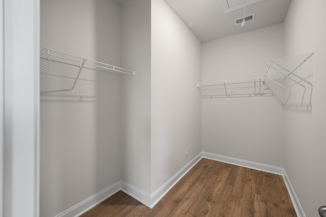 139 Dantzler Rd, Harleyville, SC 29448 - spacious closet featuring attic access, visible vents, and wood finished floors