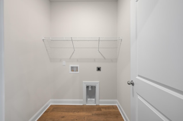 139 Dantzler Rd, Harleyville, SC 29448 - laundry area featuring hookup for a washing machine, wood finished floors, laundry area, electric dryer hookup, and baseboards