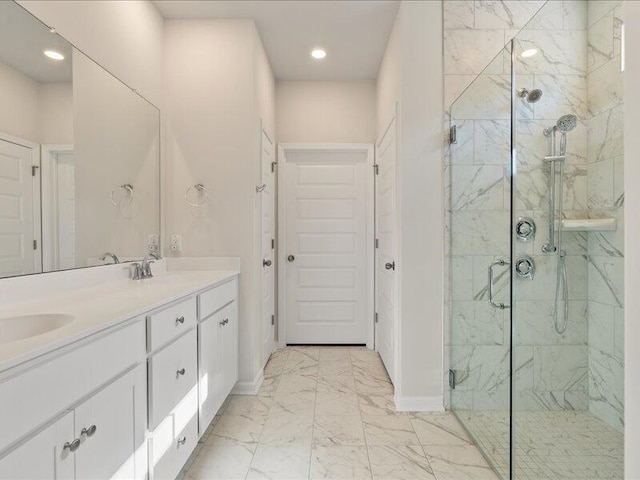 bathroom with vanity and walk in shower