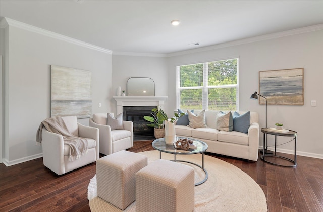 living room with dark hardwood / wood-style floors and crown molding