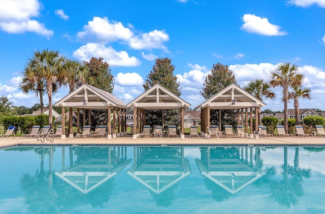 view of swimming pool featuring a gazebo and a patio