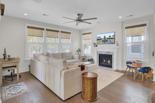 1821 Mead Ln, Johns Island, SC 29455 - living area with a ceiling fan, a fireplace, wood finished floors, plenty of natural light, and recessed lighting