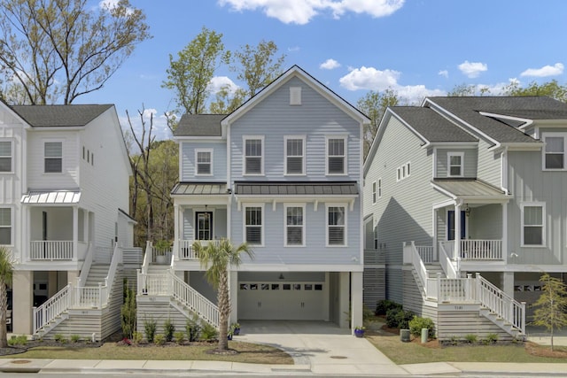 1821 Mead Ln, Johns Island, SC 29455 - coastal inspired home with stairway, a standing seam roof, a porch, concrete driveway, and metal roof