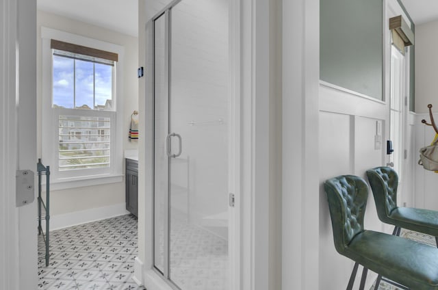 1821 Mead Ln, Johns Island, SC 29455 - bathroom with plenty of natural light, tile patterned floors, a shower stall, and vanity