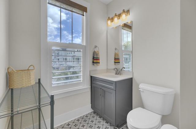 1821 Mead Ln, Johns Island, SC 29455 - half bath featuring tile patterned floors, toilet, vanity, and baseboards