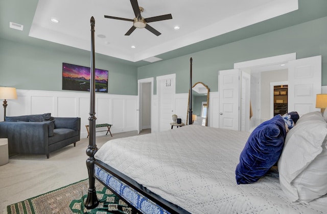 1821 Mead Ln, Johns Island, SC 29455 - bedroom featuring a raised ceiling, a wainscoted wall, carpet floors, recessed lighting, and a decorative wall