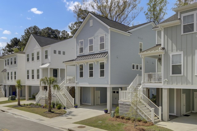 1821 Mead Ln, Johns Island, SC 29455 - beach home featuring a carport, stairs, a standing seam roof, and driveway