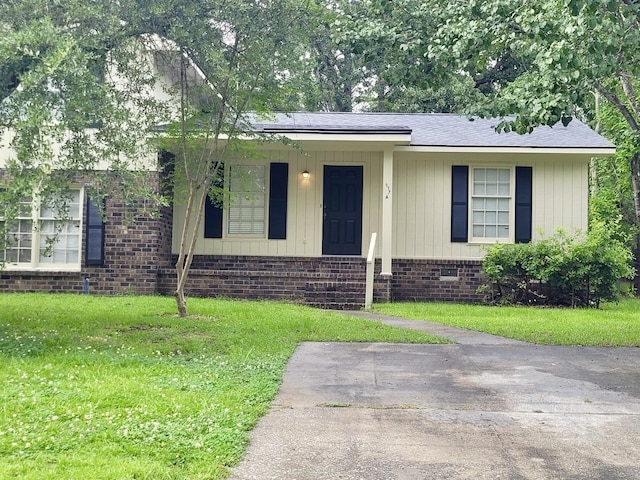 117 Roberta Dr Unit A/B, Summerville, SC 29485 - view of front of house with a front lawn, covered porch, and a shingled roof
