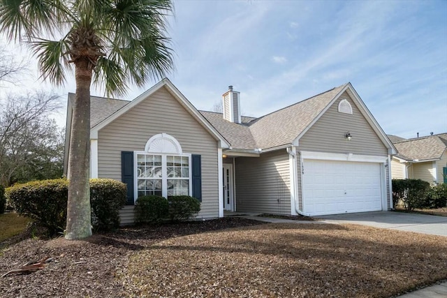 single story home featuring a garage, a shingled roof, a chimney, and concrete driveway