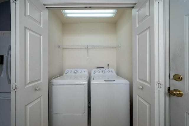 laundry room featuring laundry area and washer and clothes dryer