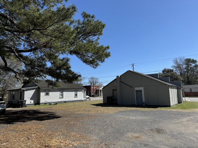 1488 Remount Rd, North Charleston, SC 29406 - view of property exterior featuring board and batten siding