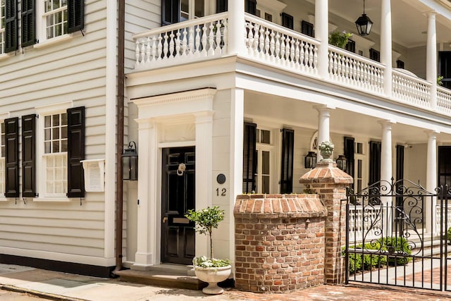 12 Orange St, Charleston, SC 29401 - view of exterior entry featuring a balcony