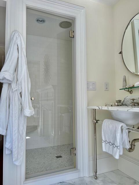 12 Orange St, Charleston, SC 29401 - full bathroom with a shower stall and marble finish floor