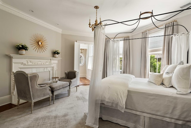 12 Orange St, Charleston, SC 29401 - bedroom with an inviting chandelier, visible vents, baseboards, and ornamental molding