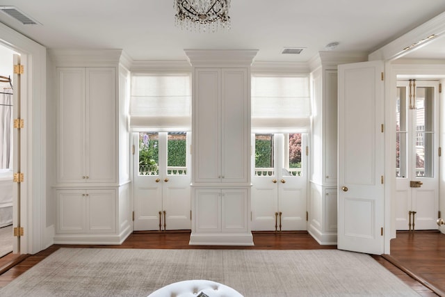 12 Orange St, Charleston, SC 29401 - interior space featuring a chandelier, visible vents, and dark wood-style floors