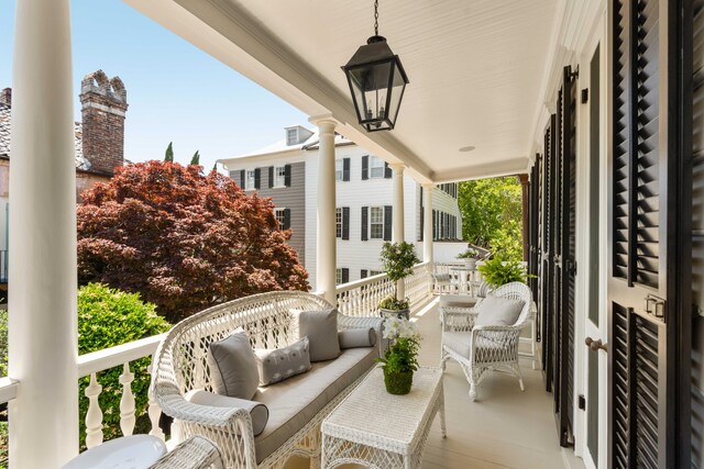 12 Orange St, Charleston, SC 29401 - balcony featuring a porch