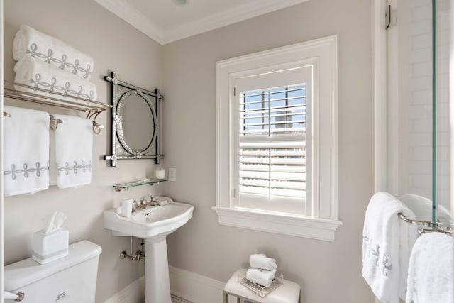 12 Orange St, Charleston, SC 29401 - bathroom featuring toilet, baseboards, and ornamental molding