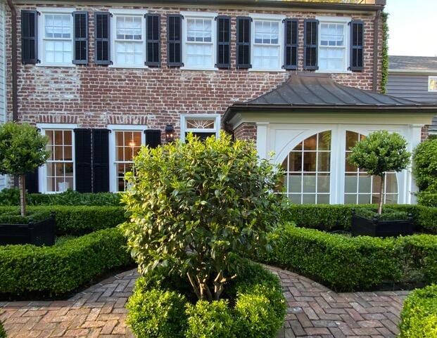 12 Orange St, Charleston, SC 29401 - view of front of property featuring metal roof, cooling unit, and a standing seam roof