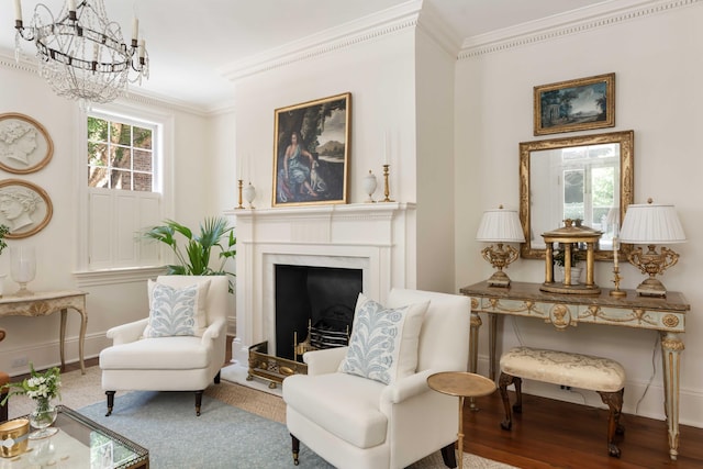 12 Orange St, Charleston, SC 29401 - living area with a high end fireplace, ornamental molding, a notable chandelier, and baseboards