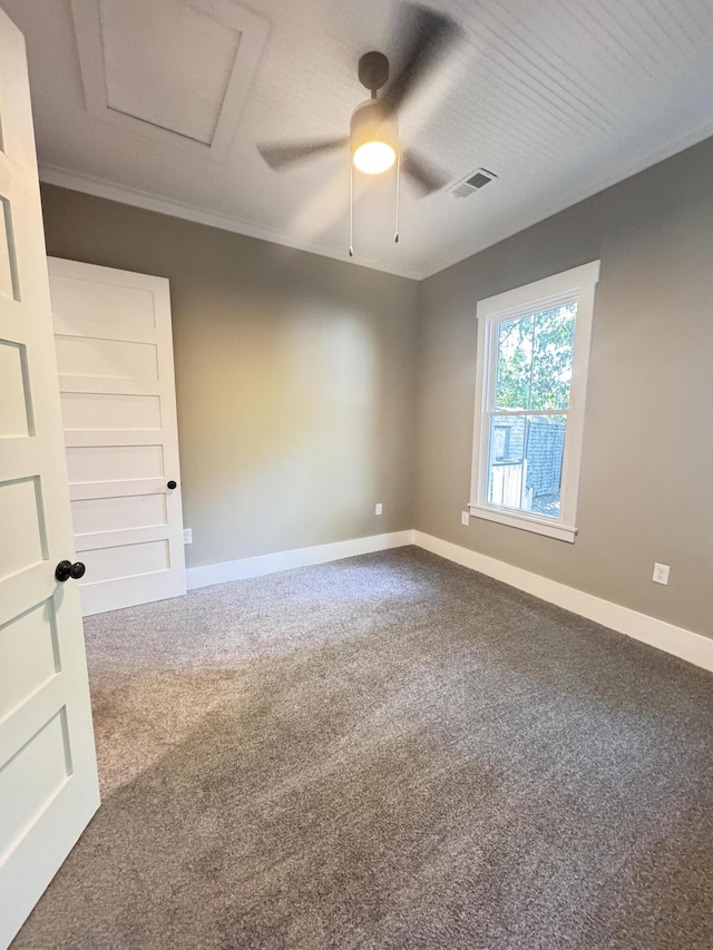 unfurnished room featuring carpet floors, baseboards, and visible vents