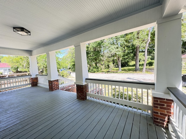 wooden deck with a porch