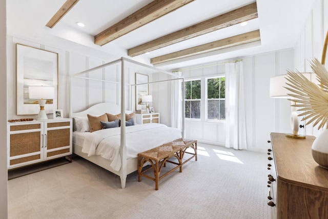 bedroom featuring recessed lighting, light colored carpet, and beamed ceiling