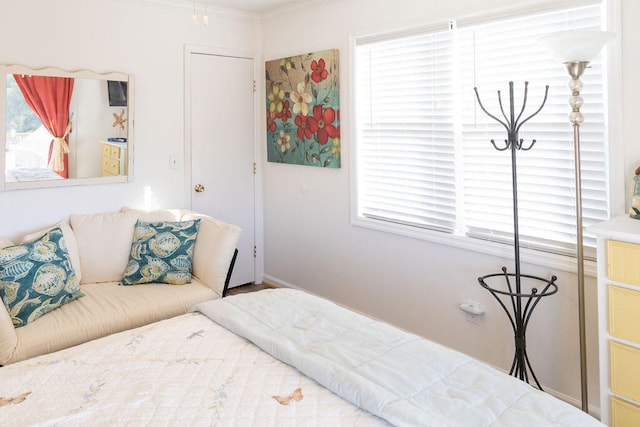 bedroom with ornamental molding