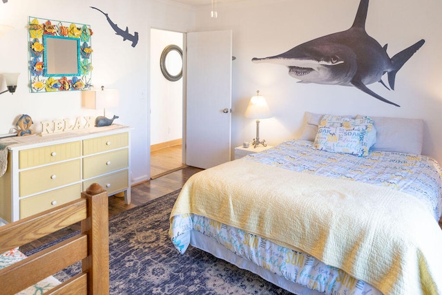 bedroom featuring wood-type flooring