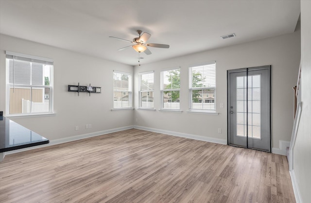 7780 Montview Rd, North Charleston, SC 29418 - empty room with a ceiling fan, light wood-style floors, and baseboards