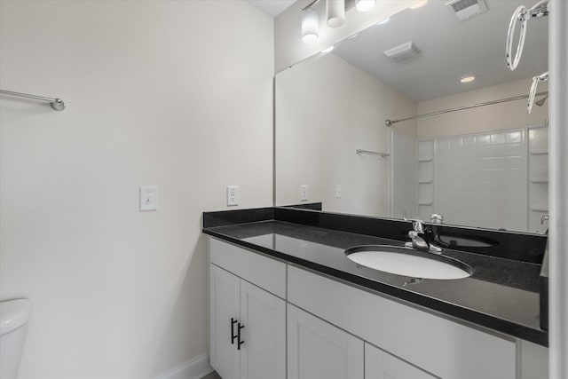 7780 Montview Rd, North Charleston, SC 29418 - bathroom with vanity, toilet, and a shower