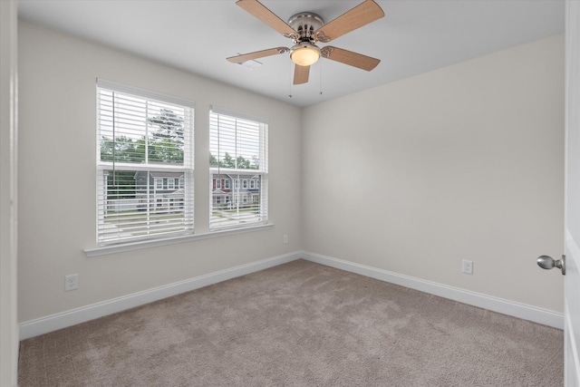 7780 Montview Rd, North Charleston, SC 29418 - carpeted spare room with baseboards and ceiling fan