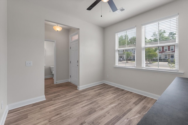 7780 Montview Rd, North Charleston, SC 29418 - unfurnished room with a ceiling fan, light wood-style floors, and baseboards