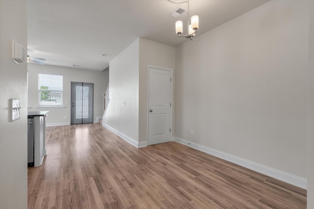 7780 Montview Rd, North Charleston, SC 29418 - unfurnished dining area featuring light wood-style flooring, a chandelier, baseboards, and ceiling fan