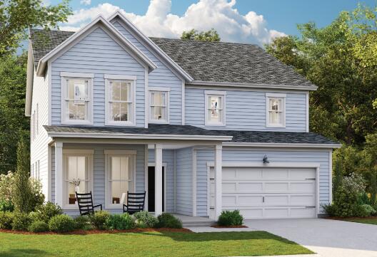 view of front of home featuring an attached garage, covered porch, and driveway