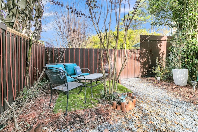 view of yard featuring a fenced backyard