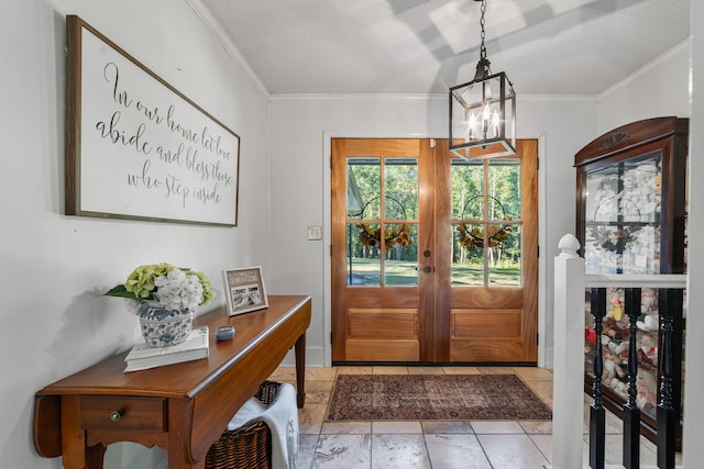 doorway featuring ornamental molding, a textured ceiling, light tile patterned floors, a chandelier, and french doors