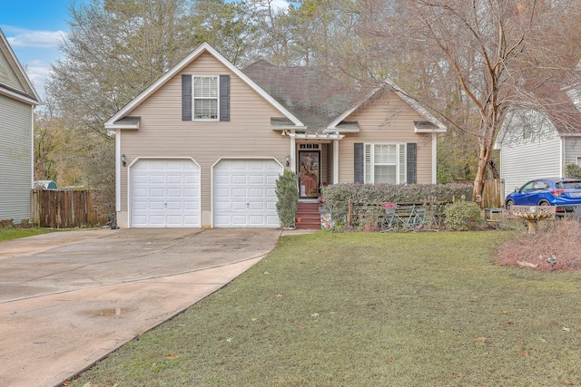 view of front of house with a garage and a front lawn