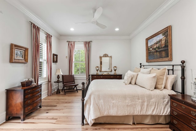bedroom with crown molding, light wood finished floors, recessed lighting, baseboards, and a ceiling fan