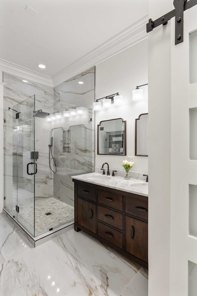 bathroom featuring ornamental molding, marble tiled flooring, a marble finish shower, double vanity, and recessed lighting