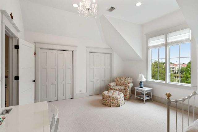 living area with carpet floors, vaulted ceiling, recessed lighting, and a chandelier