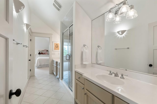 full bathroom with connected bathroom, a stall shower, tile patterned floors, vanity, and lofted ceiling