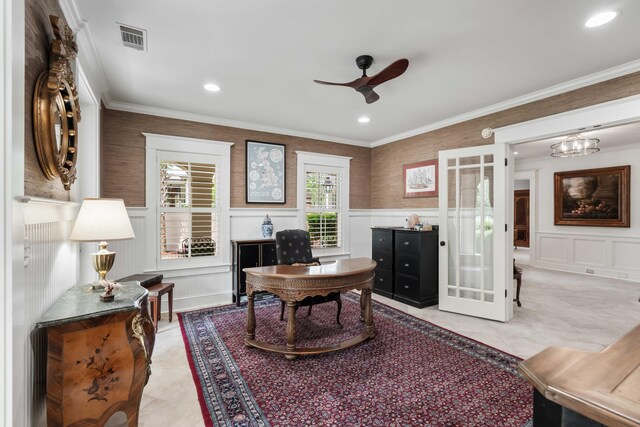 office space featuring a decorative wall, a ceiling fan, a wainscoted wall, recessed lighting, and ornamental molding