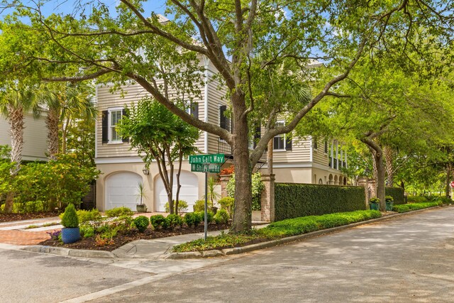view of front of property featuring stucco siding and a garage
