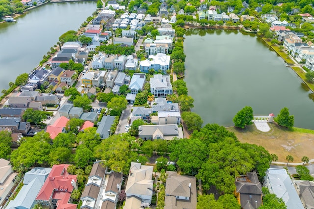 aerial perspective of suburban area featuring a large body of water