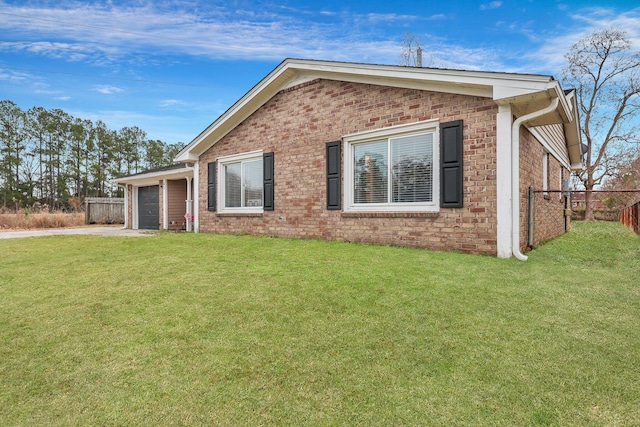 view of front of house with a garage and a front yard